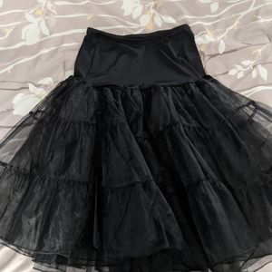 Black knee length crinoline petticoat. Large